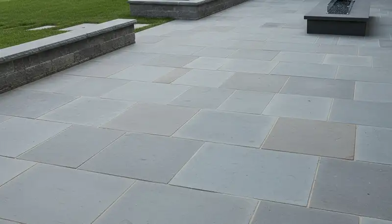 Large format stone slab paver installation with modern design by Chop Chop Landscaping in Staten Island, NY